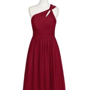 Burgundy one shoulder floor length gown.